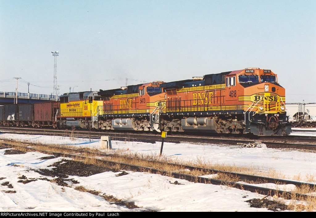 Empty hopper train rolls east